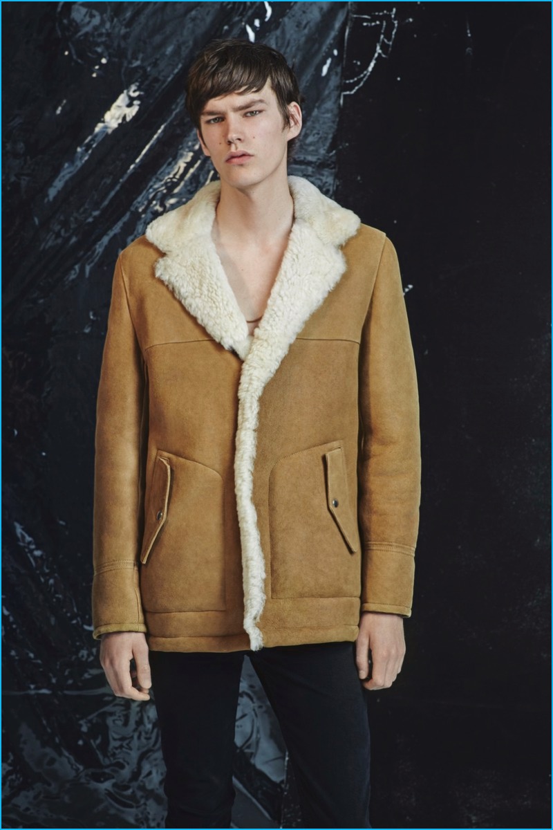 Elias de Poot represents one of the biggest fall trends, wearing a shearling jacket from IRO's latest men's collection.