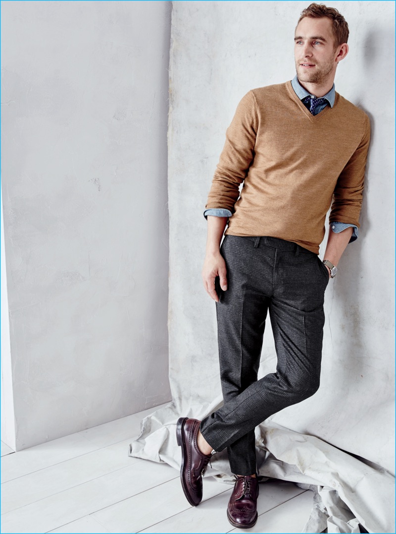 Will Chalker is a smart vision in a v-neck sweater, dress shirt, tie, and check trousers from J.Crew.