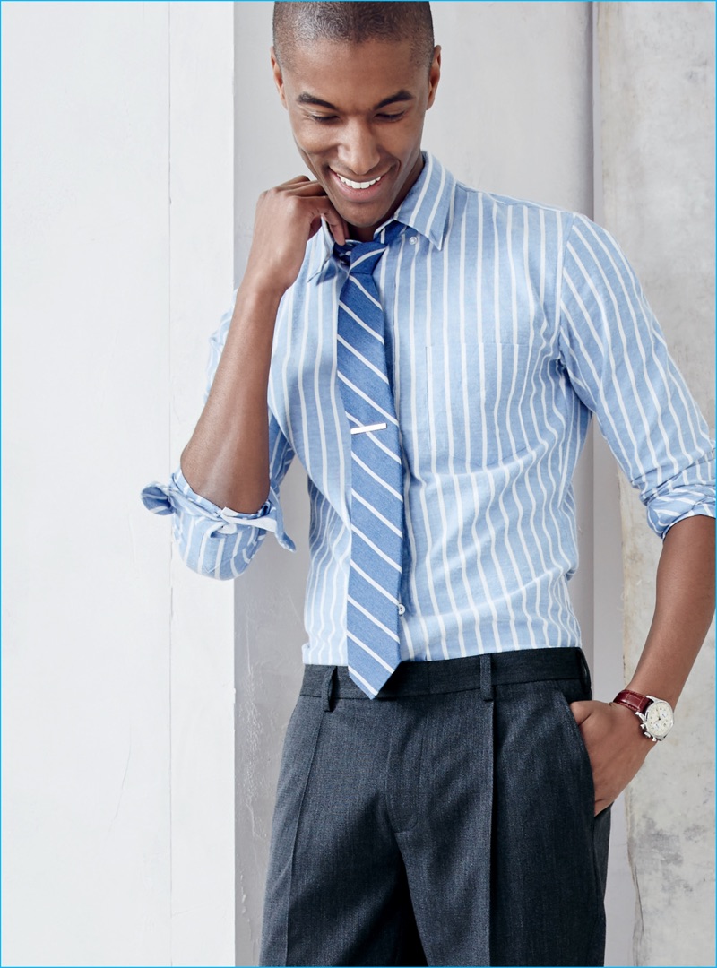 Claudio Monteiro dons a striped dress shirt and tie from J.Crew.