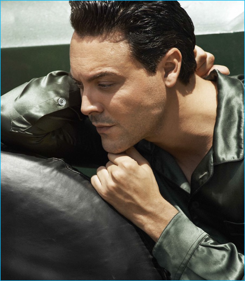 Jack Huston steals a quiet moment in a satin Dolce & Gabbana shirt.