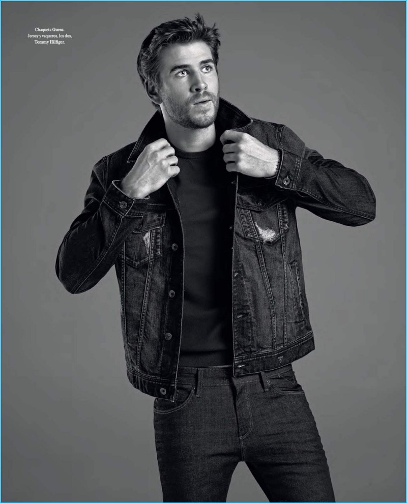 Liam Hemsworth embraces casual style in a denim jacket from GUESS with Tommy Hilfiger jeans.