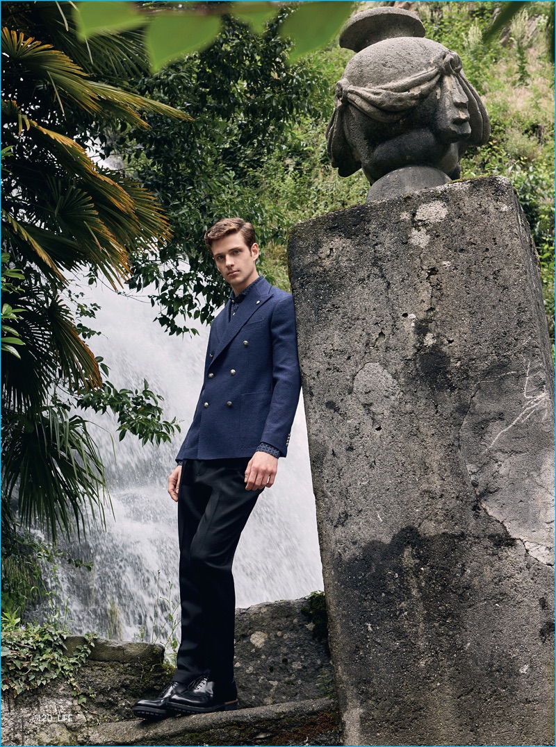 Lucas Mascarini embraces classic tailoring in a double-breasted Tagliatore jacket with a Xacus shirt, as well as trousers and dress shoes from Berluti.