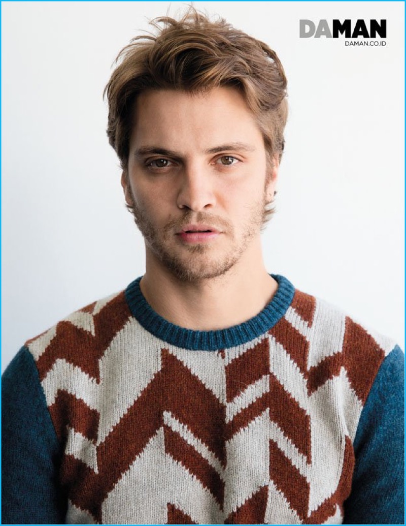 Luke Grimes wears a Salvatore Ferragamo sweater.