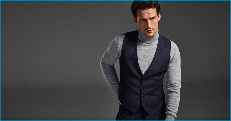 Sam Webb embraces a chic look in a turtleneck sweater and waistcoat from Massimo Dutti's fall-winter 2016 Limited Edition collection.