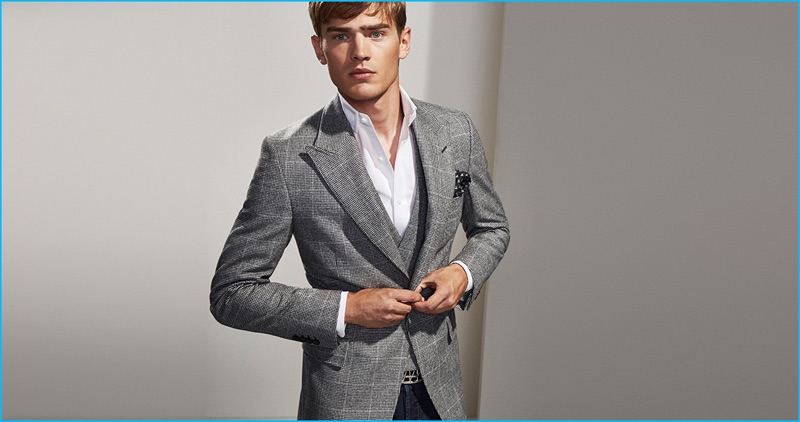 Bo Develius dons a grey three-piece suit from Massimo Dutti's Personal Tailoring collection.