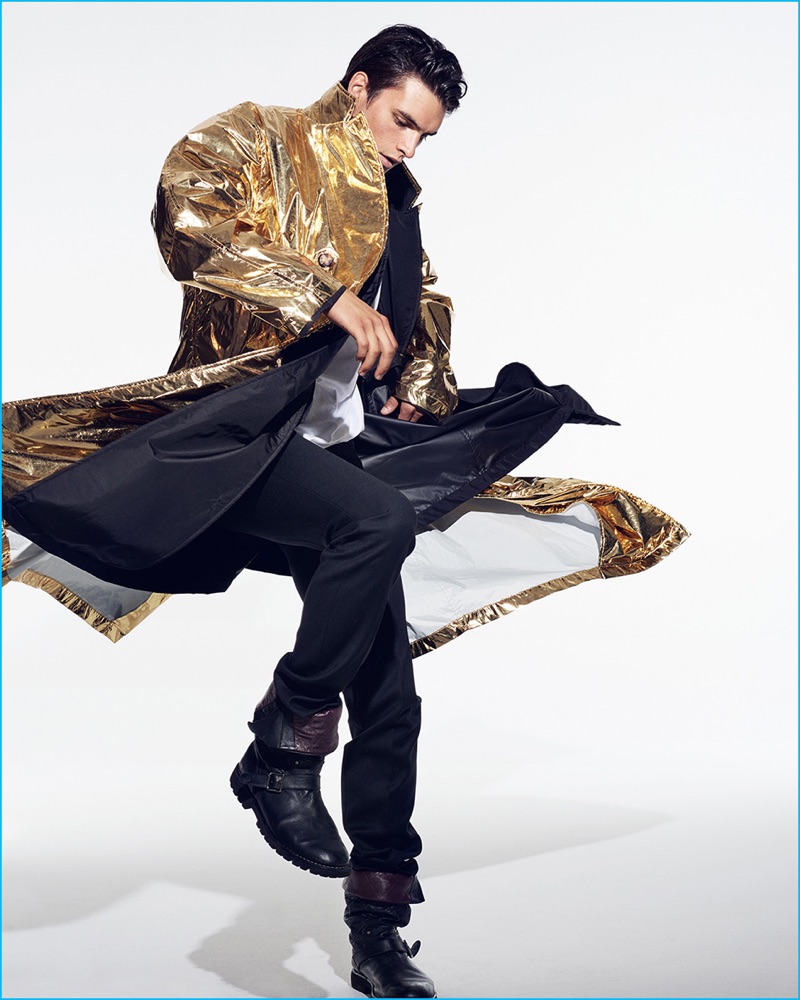Matthew Terry hits the studio in a gold metallic coat from Calvin Klein Collection.