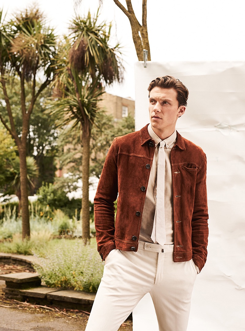 Samuel wears jacket Oliver Spencer, top Samsoe & Samsoe, trousers Hacket London, and tie stylist's own.