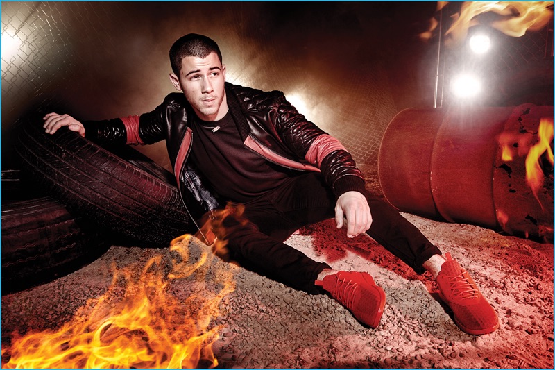 Nick Jonas rocks Creative Recreation's red Deross sneakers for the brand's fall-winter 2016 campaign.