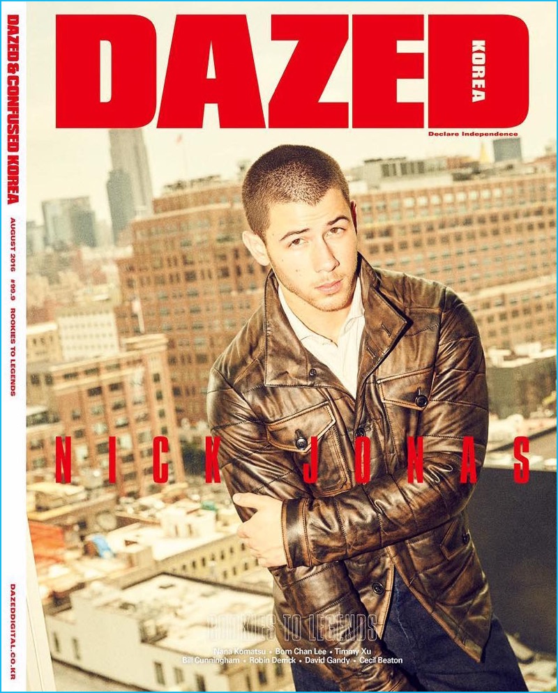 Nick Jonas rocks a brown leather jacket for the August 2016 cover of Dazed Korea.