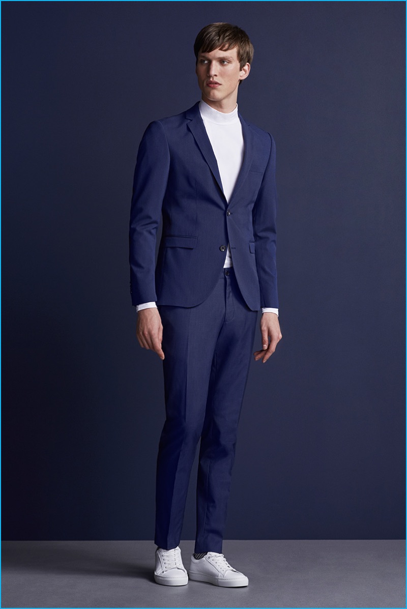 Malthe Lund Madsen dons a blue suit with white sneakers from Premium by Jack & Jones' fall-winter 2016 NOOS collection.