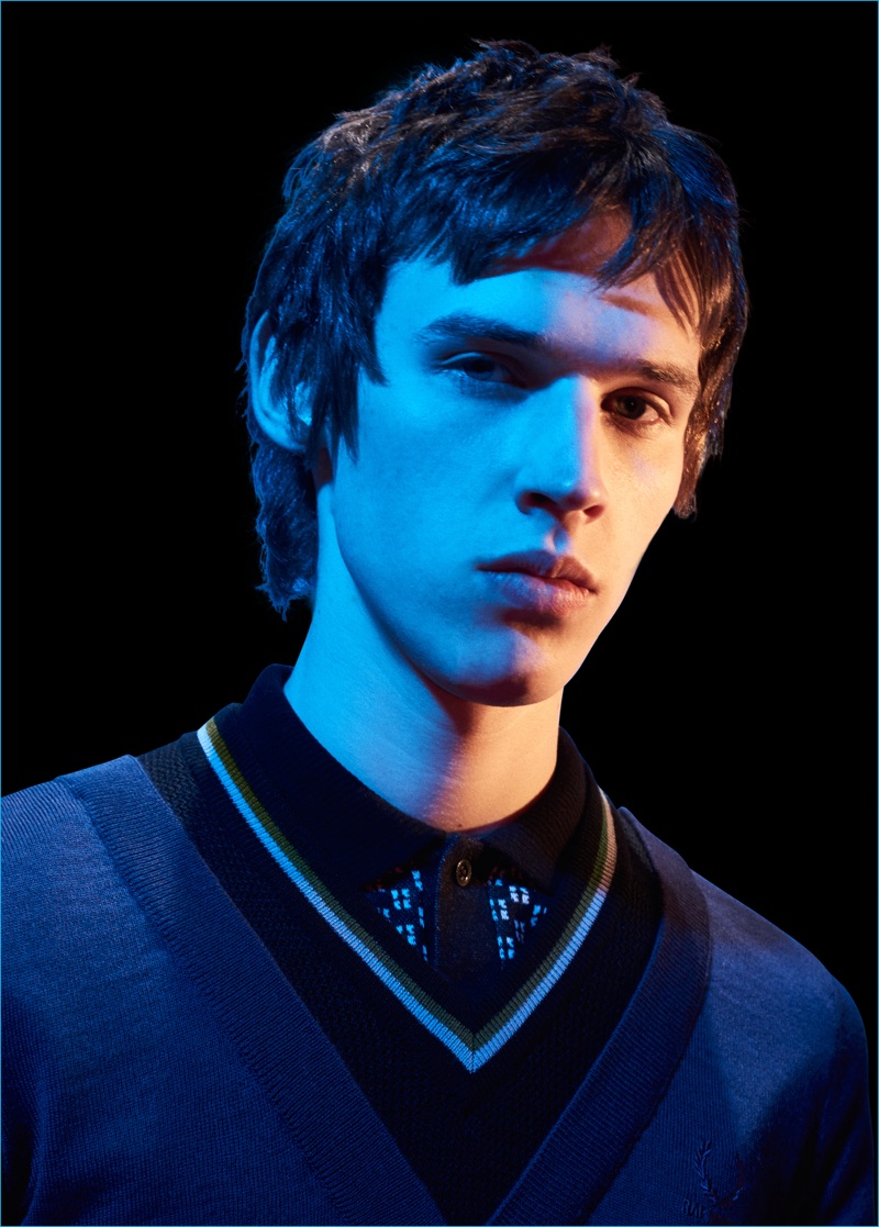 Raf Simons for Fred Perry embraces knits for fall-winter 2016, layering a v-neck sweater with a polo.