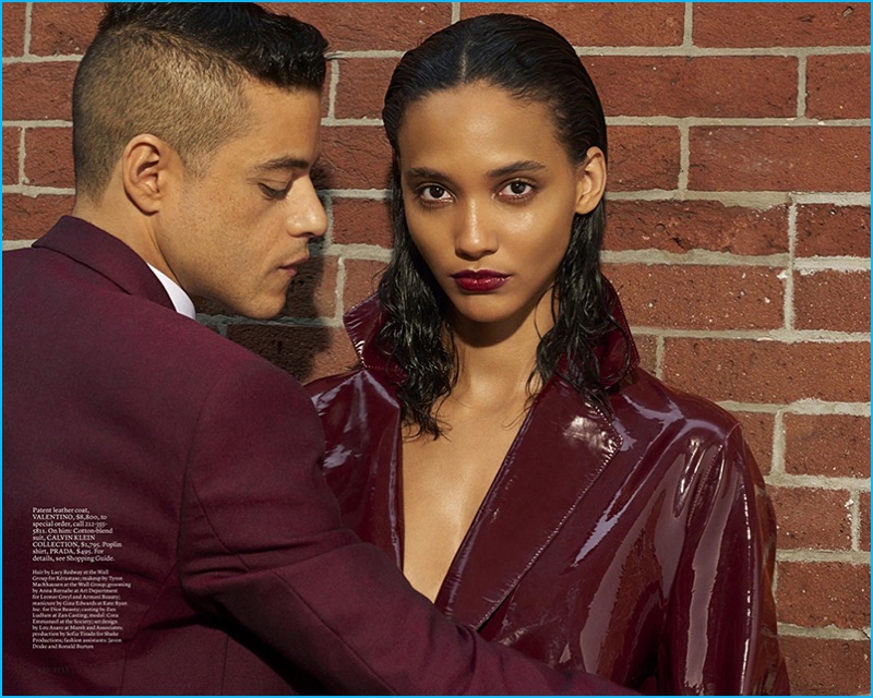 Rami Malek joins Cora Emmanuel for Elle, wearing a burgundy Calvin Klein Collection suit.