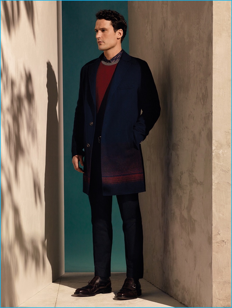 Sam Webb embraces navy and deep red in a look from Salvatore Ferragamo's pre-fall 2016 men's collection.