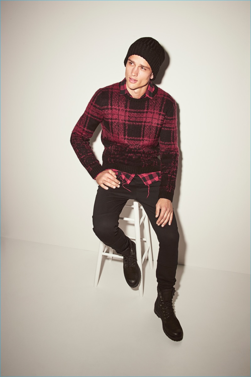 Simon Nessman embraces red plaid and buffalo checks sfor a laid-back look for River Island's fall-winter 2016 campaign.
