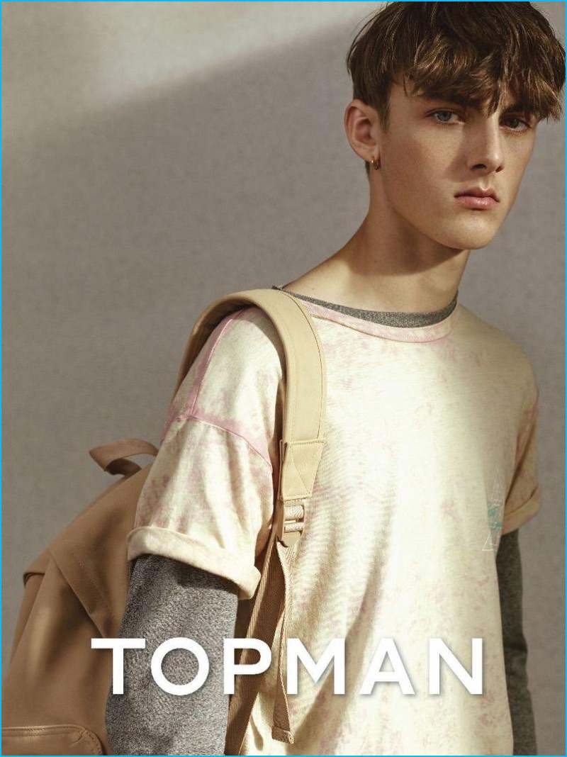 Topman revisits 90s style, layering a t-shirt over a long sleeve tee.