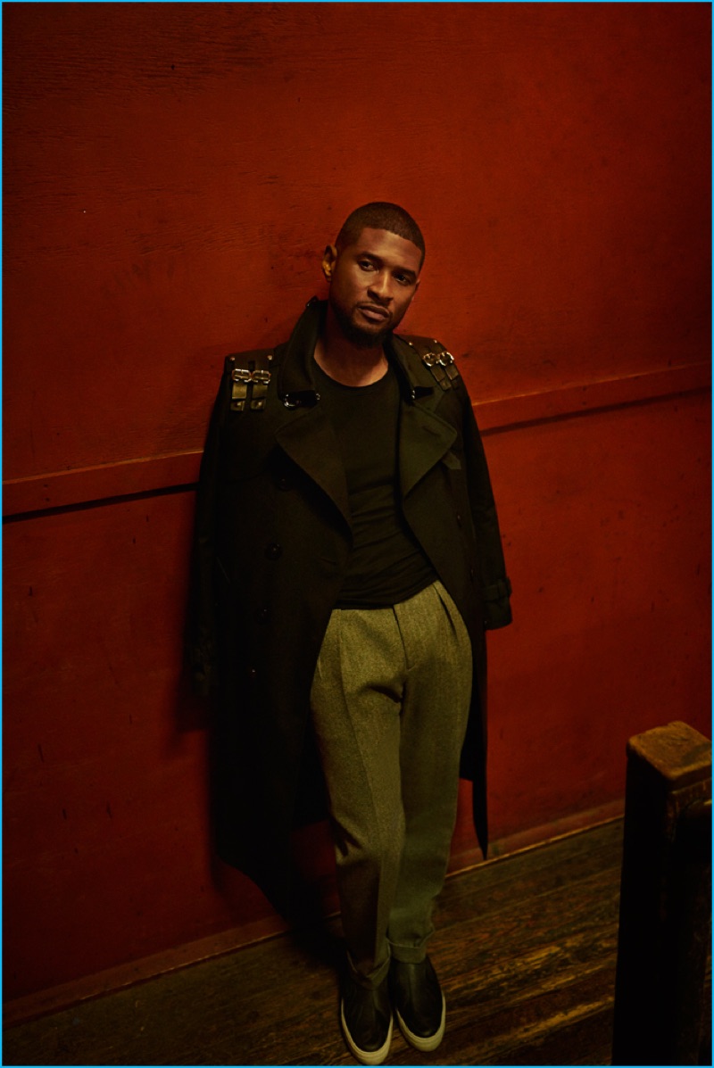 Usher dons a Valentino trench coat with a G-Star Raw shirt and pleated Salvatore Ferragamo trousers.