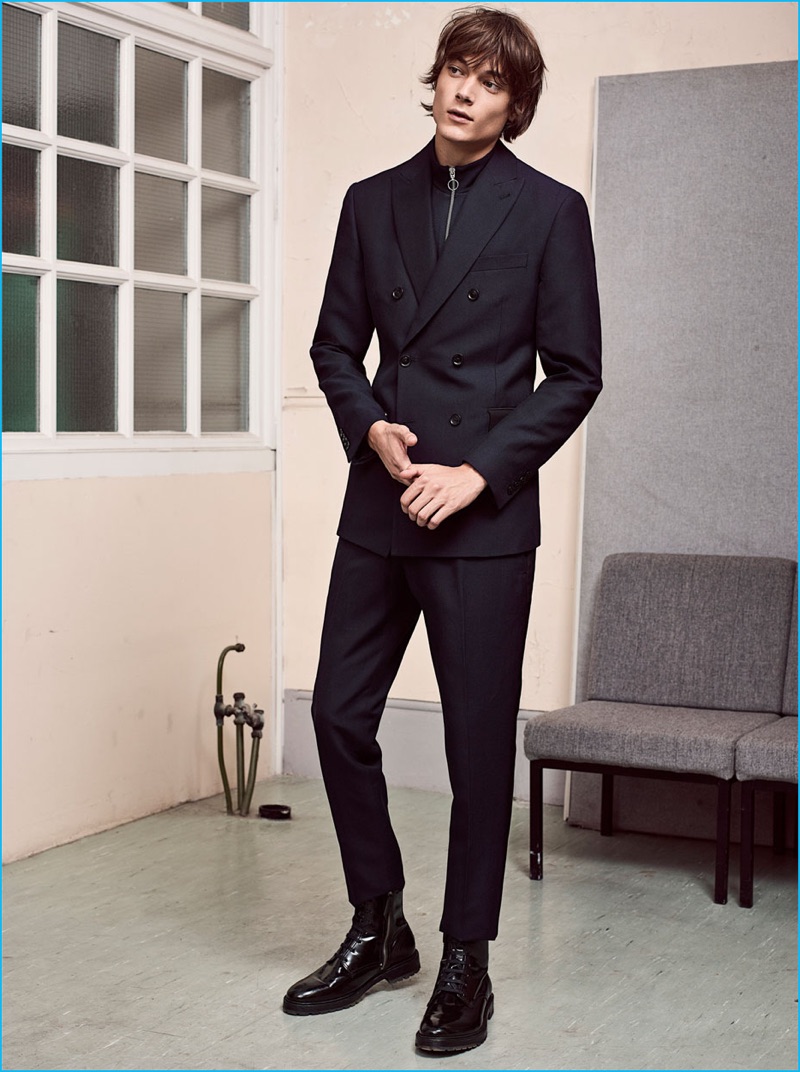 Zara Man updates the double-breasted suit with a full-zip sweater replacing a dress shirt.