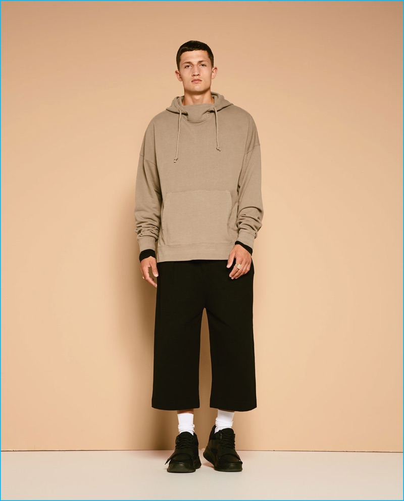 Frederik is front and center in a hooded sweatshirt and oversized pants from Zara's fall-winter 2016 Streetwise collection.
