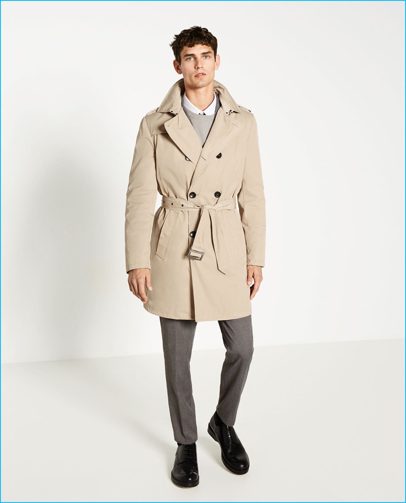 Arthur Gosse pictured in a tan trench coat from Zara Man.