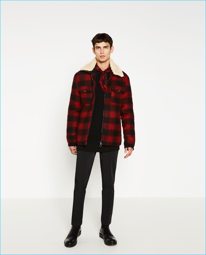 Arthur Gosse rocks a red and black buffalo check jacket from Zara Man.