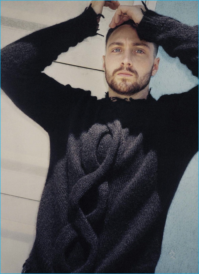 Aaron Taylor-Johnson rocks a deconstructed cable knit sweater from Etro.