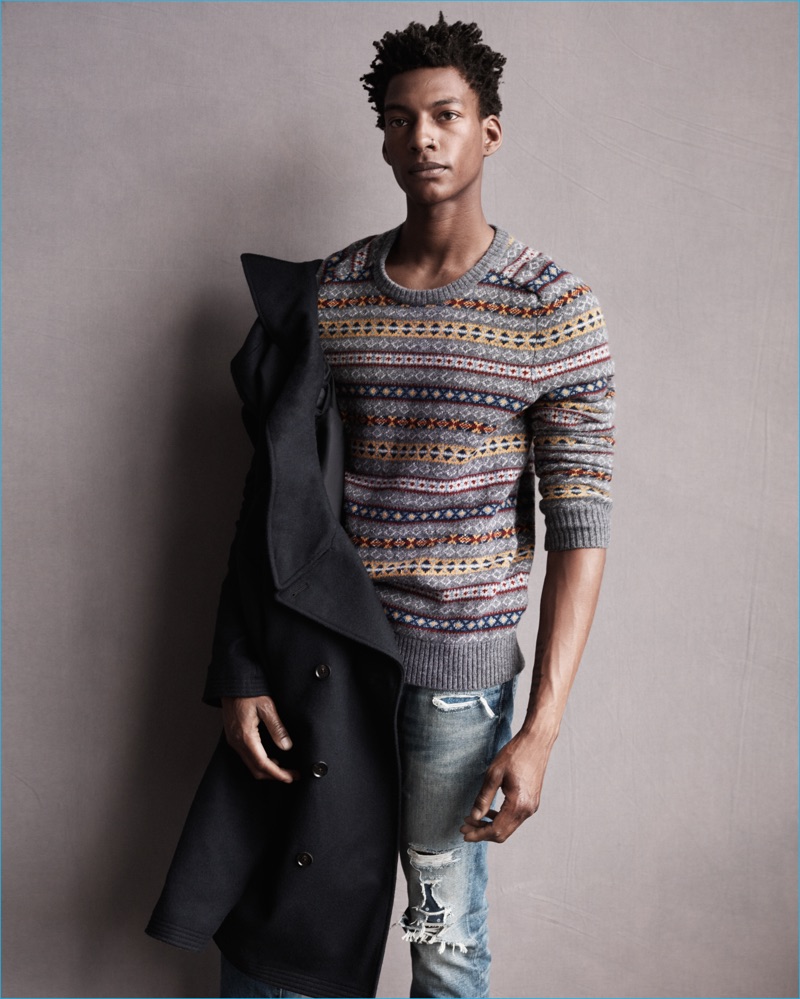 Ty Ogunkoya wears a patterned crewneck sweater for Abercrombie & Fitch's fall-winter 2016 men's campaign.