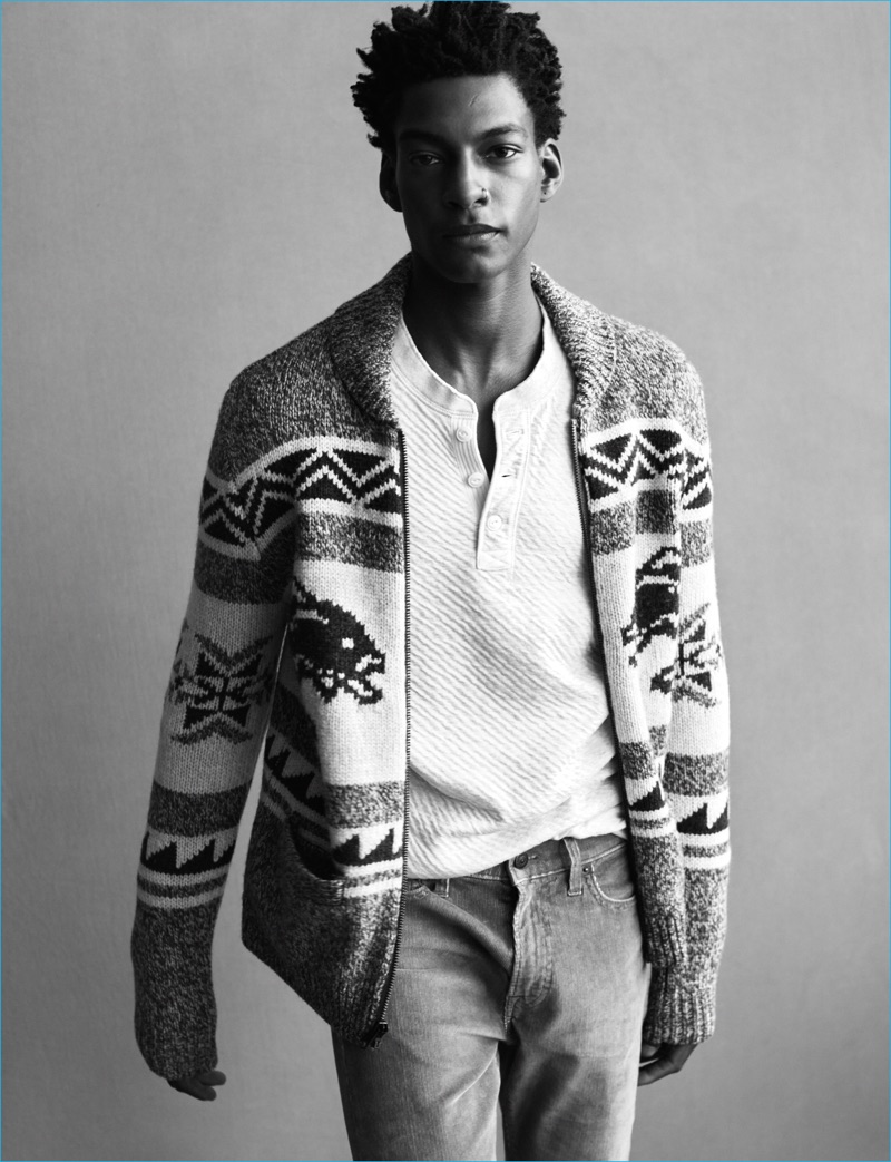 Ty Ogunkoya sports a full-zip patterned knit sweater for Abercrombie & Fitch's fall-winter 2016 men's campaign.