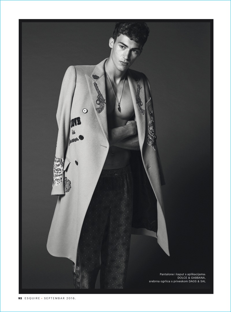 Alessio Pozzi channels Dolce & Gabbana's western attitude in a coat and silk patterned pants for Esquire Serbia.