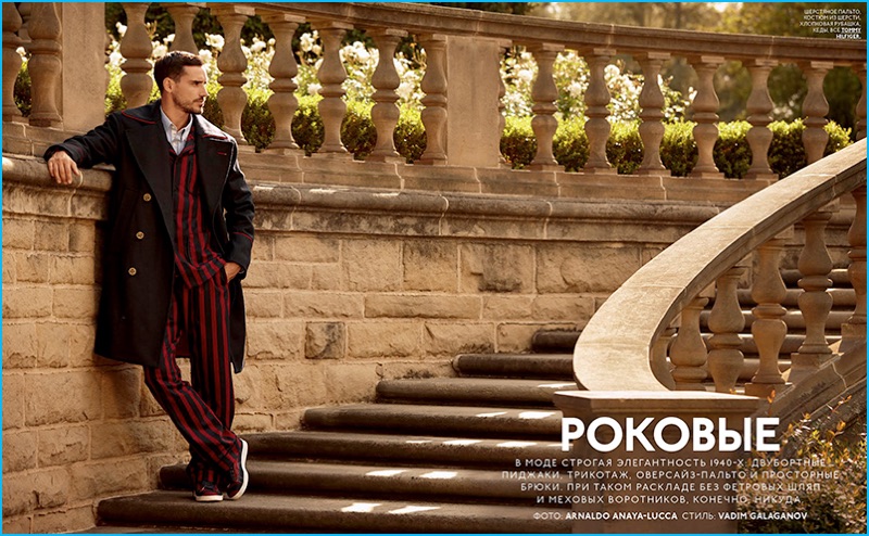 Arthur Kulkov pictured in a red and black striped Tommy Hilfiger suit for GQ Style Russia.