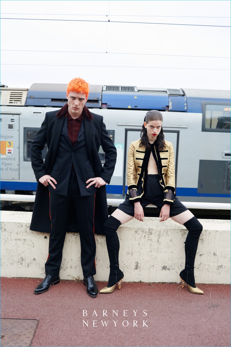 Posing alongside Lily McMenamy, Dustin Phil wears a fall-winter 2016 look from Givenchy.