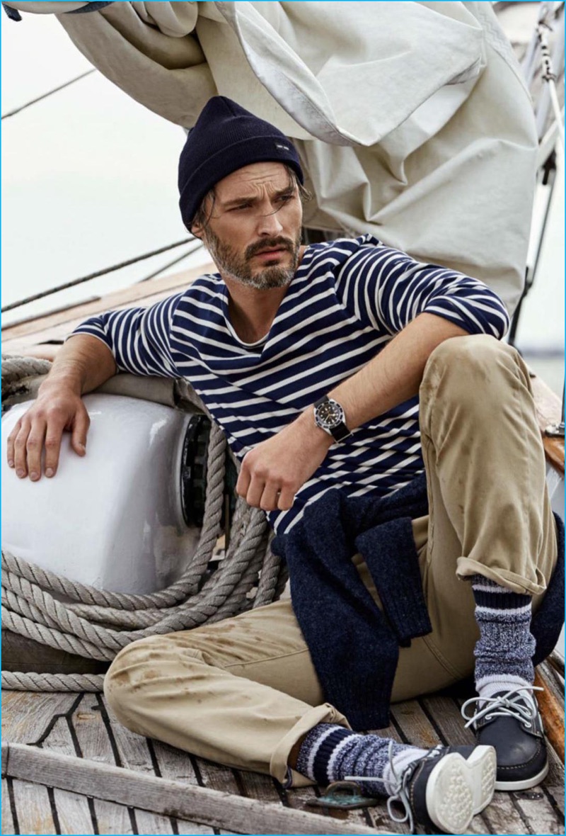 Ben Hill pictured in a striped pullover from Uniqlo with Dockers pants for GQ France.