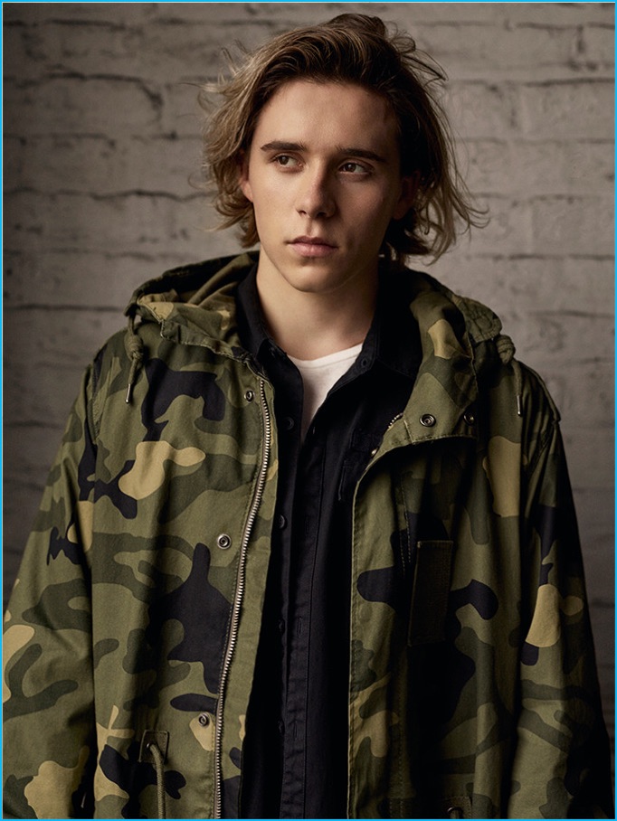 Brooklyn Beckham sports a camouflage jacket from Pull & Bear.