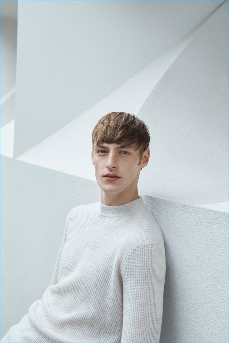 Roberto Sipos wears a cashmere waffle sweater from the COS x Agnes Martin collection.