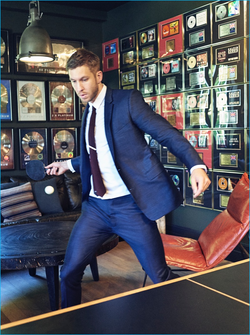 Calvin Harris is clad in a blue Dior Homme suit for British GQ.
