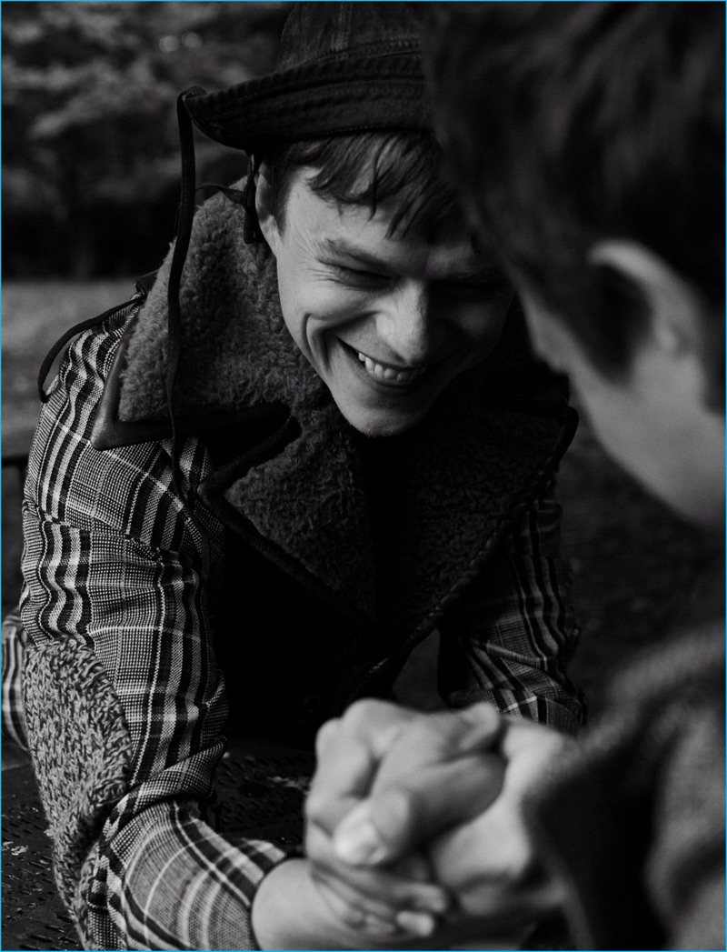 Dane DeHaan arm wrestles with Ansel Elgort for the pages of L'Express Styles.