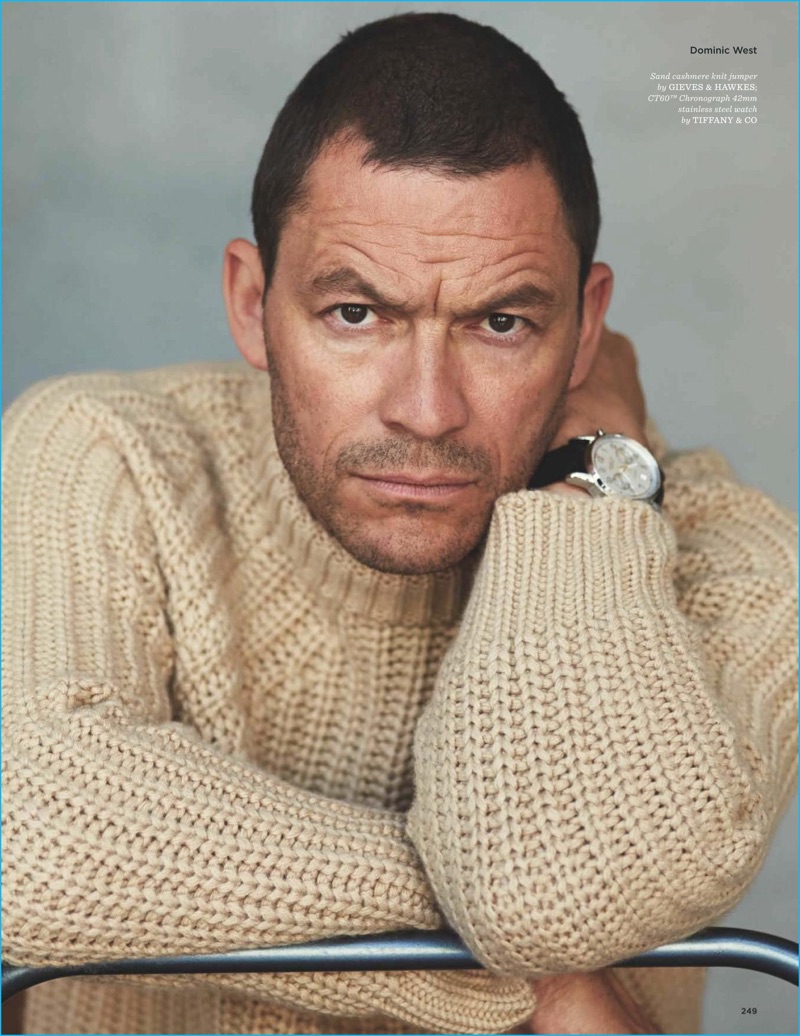 Dominic West dons a cashmere sweater from Gieves & Hawkes with a watch from Tiffany & Co.