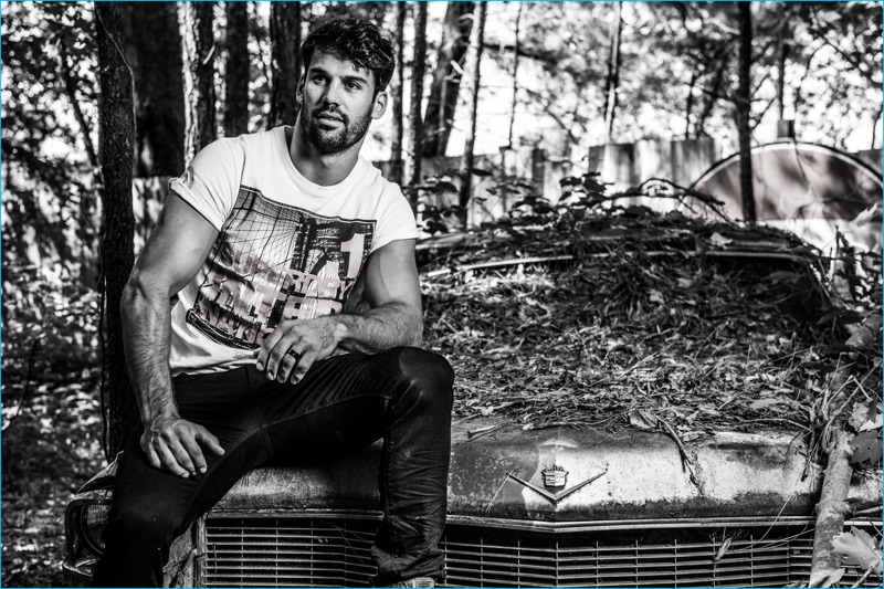 Eric Decker wears Superdry's Brooklyn t-shirt and Corporal slim jeans for the brand's fall-winter 2016 campaign.