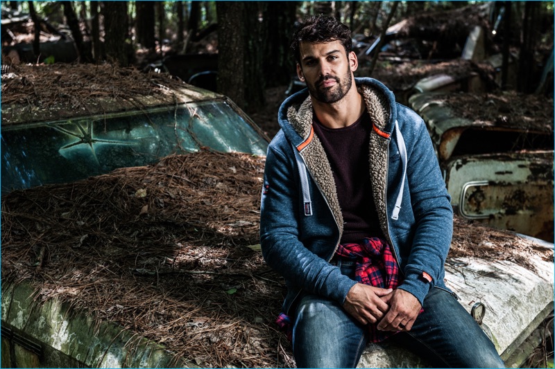 Eric Decker wears Superdry's Premium City crew, Orange Label heavy winter zip hoodie, milled flannel shirt, and Corporal slim jeans for the brand's fall-winter 2016 campaign.