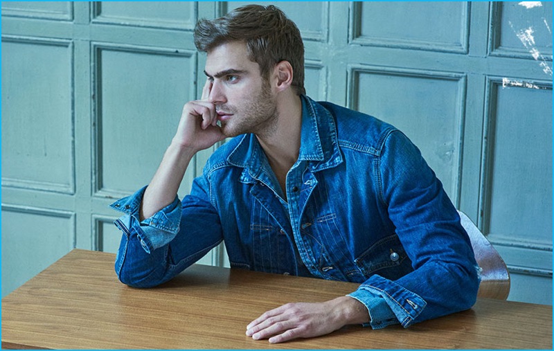 George Alsford doubles down on denim in a Dsquared2 denim jacket with a Kenzo denim shirt.