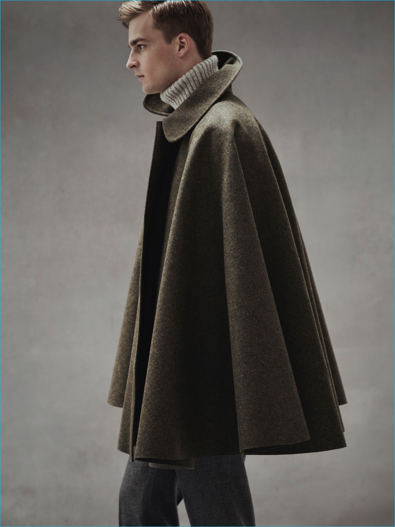 Explore New Silhouettes: Thorben Gartner wears cape coat Cini, turtleneck sweater Ami, and trousers Pence.
