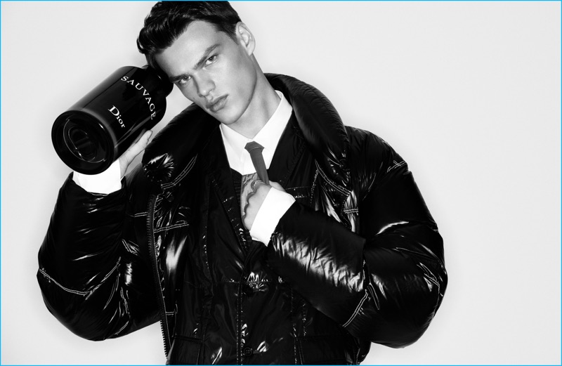 Filip Hrivnak rocks a black puffer jacket from Dior Homme for Elle Men China.