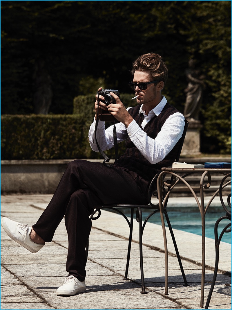 Nils Butler relaxes poolside in Ermenegildo Zegna Couture for GQ España.