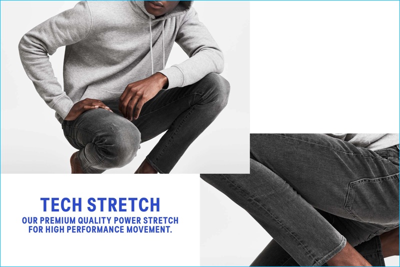Hamid Onifade models H&M's 360 Tech Stretch Skinny Jeans in black.