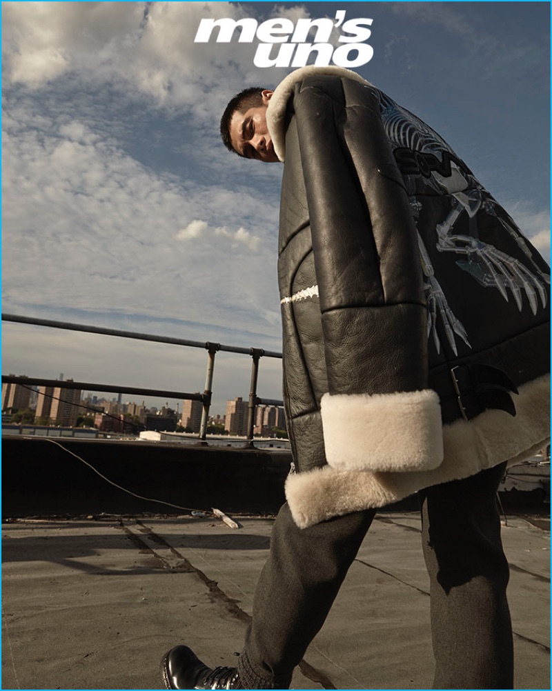 Hao Yun Xiang takes to the streets of New York in a leather and shearling coat from JUUN.J with Dolce & Gabbana pants.