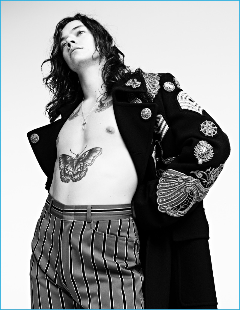 Harry Styles channels military style in a fall-winter 2016 coat from Belgian designer Dries Van Noten.