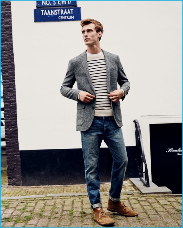 Clément Chabernaud channels nautical style in a striped Italian cashmere sweater, worn with J.Crew's Ludlow blazer, chukka boots, and distressed denim jeans.