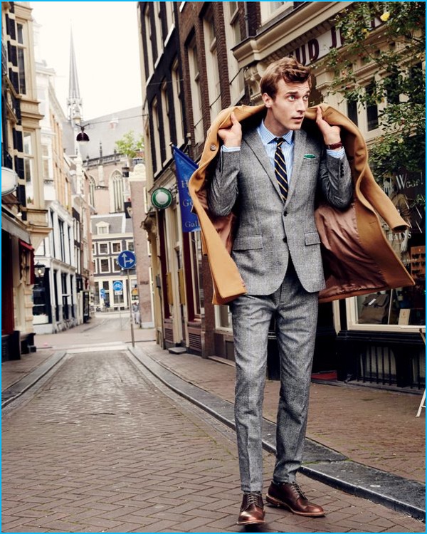 Clément Chabernaud dons a Glen plaid Ludlow suit with a topcoat from J.Crew.