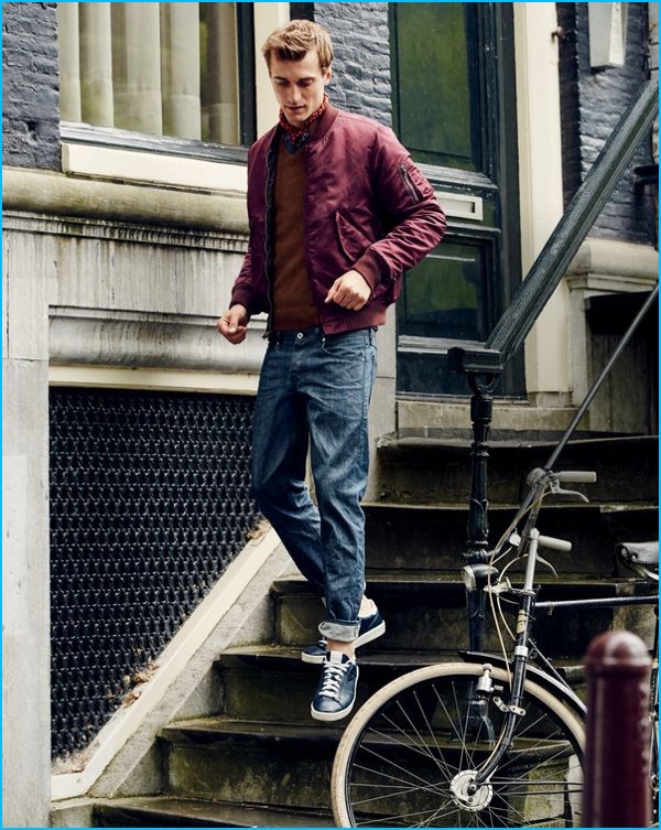 Clément Chabernaud models a bomber jacket with J.Crew's stretch selvedge jeans.