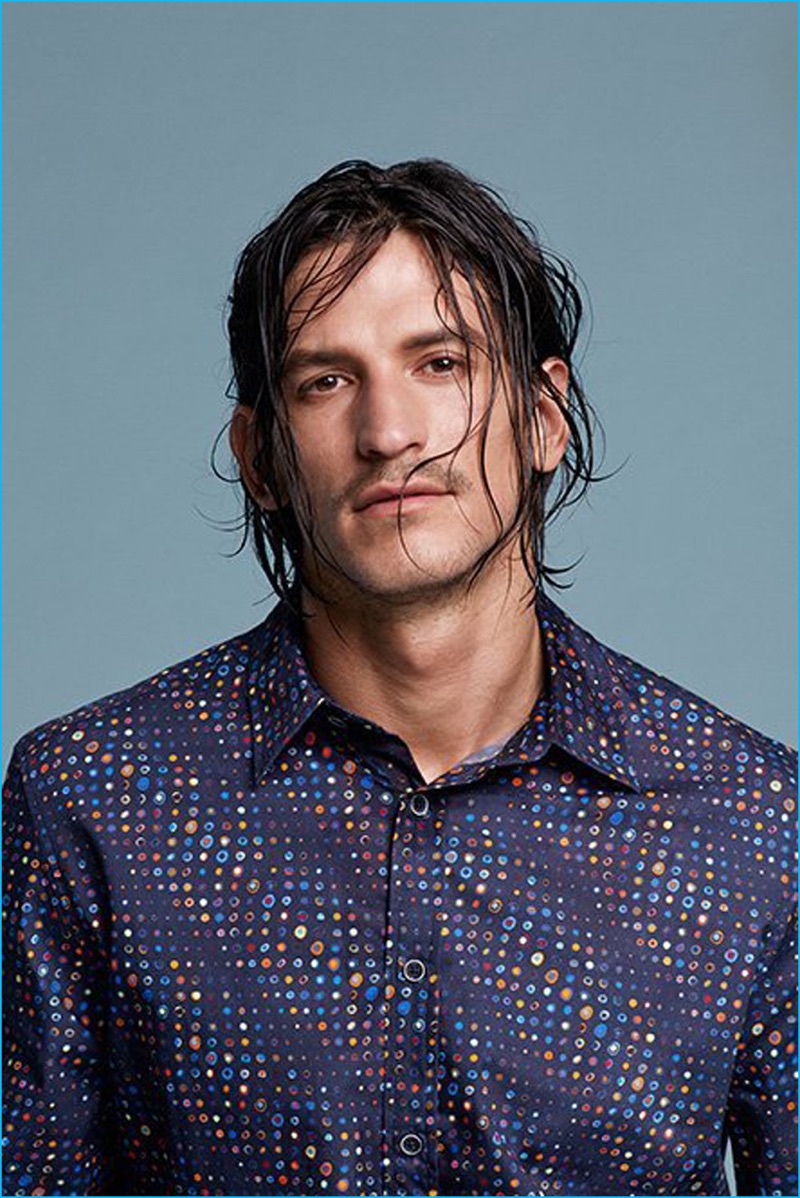 Jarrod Scott dons a micro print shirt from Desigual's fall-winter 2016 lineup.