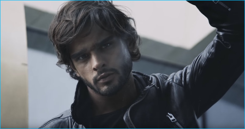 Marlon Teixeira pictured in a leather biker jacket for Jimmy Choo Man Intense's campaign film.